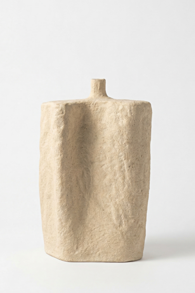 handmade white ceramic sculptural vase with vertical organic form and textured matte surface