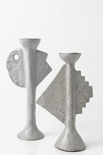 set of two handmade grey ceramic sculptural candle holders with totemic forms and textured matte surfaces